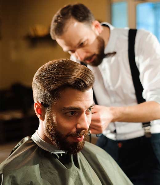 Man getting his hair styled